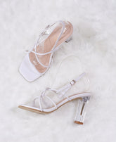Fay Square Toe Glass Heels.